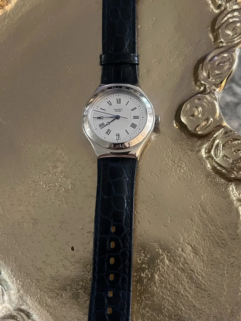 Swatch Silver Case Watch with Black Strap and White Dial